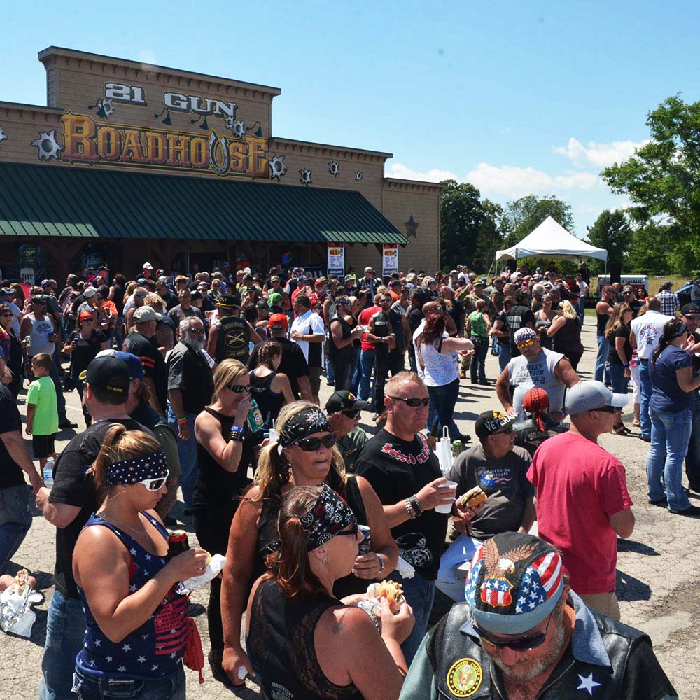 Gathering of participants outside of 21 Gun Roadhouse Saloon